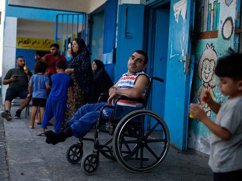 Palestinians who fled their homes amid Israeli strikes