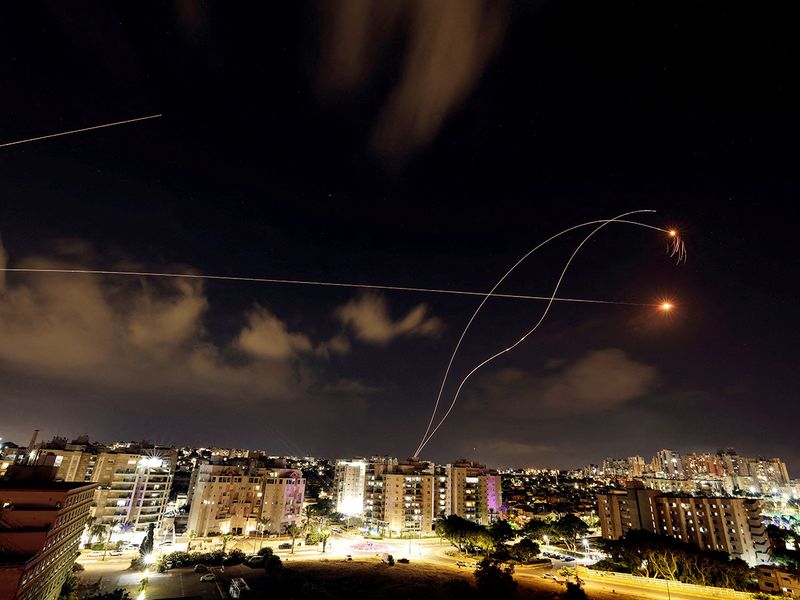 Israel's Iron Dome anti-missile system intercepts rockets launched from the Gaza Strip, as seen from Ashkelon in southern Israel October 10, 2023. 