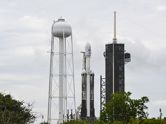 A SpaceX Falcon Heavy rocket with the Psyche spacecraft sits on launch pad 39A at NASA's Kennedy Space Center in Cape Canaveral, Florida, on October 11, 2023.  