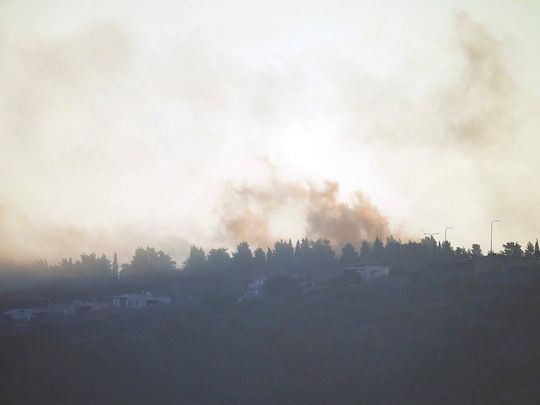 Smoke rises after Israeli shelling in the village of Odaisseh near the border with Israel in south Lebanon, Friday, Oct. 13, 2023. 