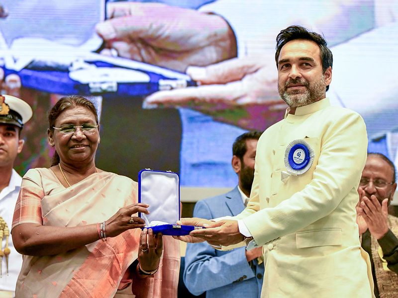 President Droupadi Murmu presents the Best Supporting Actor Award to actor Pankaj Tripathi for the film 'Mimi' during the 69th National Film Awards, at Vigyan Bhawan in New Delhi on Tuesday.