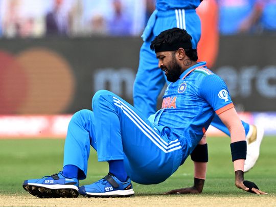 India's Hardik Pandya falls on the field 