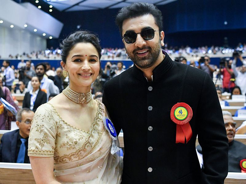 Bollywood actress Alia Bhatt and her husband and actor Ranbir Kapoor pose for a picture during the 69th National Film Awards, at Vigyan Bhawan, in New Delhi.