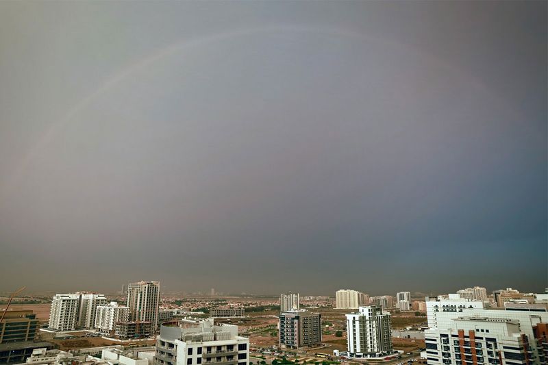 A rainbow forms in the Dubai sky after a night of thunder and lightning on 27th October, 2023. 