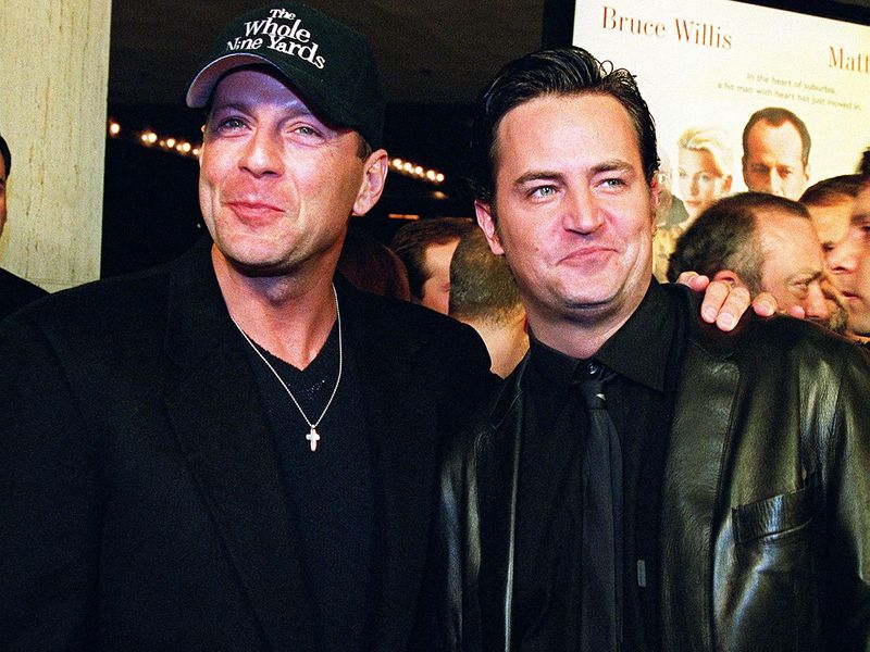 (FILES) US actors Bruce Willis (L) and Matthew Perry (R) arrive at the premiere of their new film 