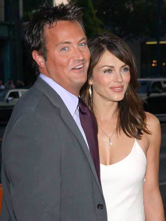 Actors Matthey Perry and Elizabeth Hurley attend the premiere of 'Serving Sara', in Beverly Hills on August 20, 2002. 