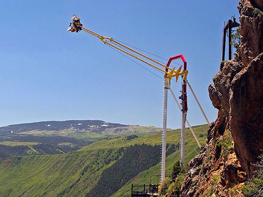 File photo: People ride the Giant Canyon Swing at Glenwood Caverns Adventure Park in Glenwood Springs, Colorado. 
