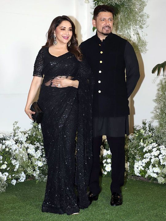 Mumbai : Actress Madhuri Dixit Nene with her husband Shriram Madhav Nene attends the Manish Malhotra's Diwali celebrations in Mumbai on Sunday, November 05, 2023. 