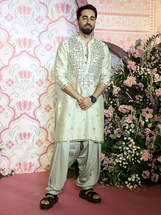Actor Ayushmann Khurrana poses for photos at the pre-Diwali party hosted by film producer Ramesh Taurani, in Mumbai, Tuesday night, Nov. 7, 2023.