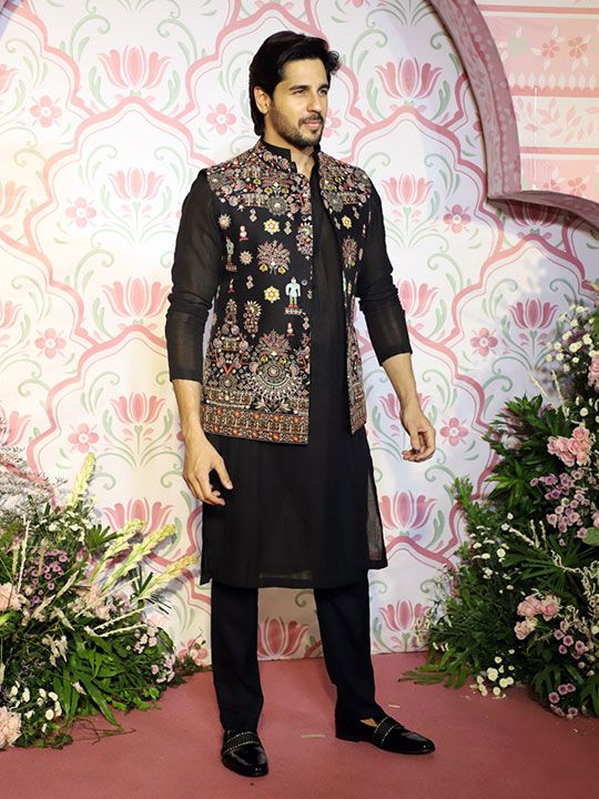 Actor Sidharth Malhotra poses for photos at the pre-Diwali party hosted by film producer Ramesh Taurani, in Mumbai, Tuesday night, Nov. 7, 2023.