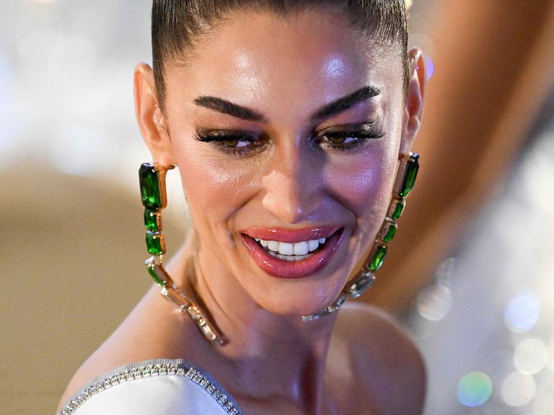 This photo taken on November 8, 2023 shows Karla Guilfu Acevedo, Miss Puerto Rico 2023, attending a gala event at the headquarters of the Ministry of Foreign Affairs of El Salvador in San Salvador. 