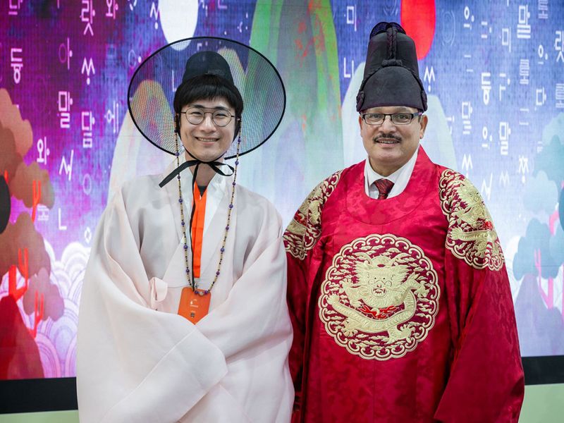 sibf-visitors-wear-hanbok,-traditional-attire-of-south-korea,-at-south-korea-pavilion-at-sibf-2023-pic-supplied-1699801539773