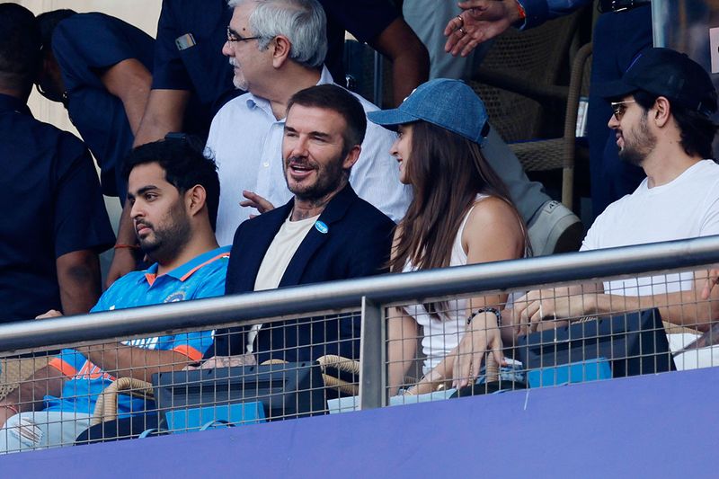David Beckham with businessman Akash Ambani and Bollywood actors Kiara Advani, Sidharth Malhotra in the stands during the match. 