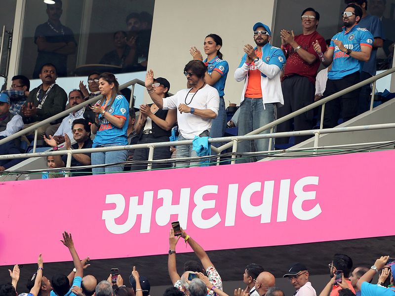 Ahmedabad, Nov 19 (ANI): Bollywood actors Shah Rukh Khan, Ranveer Singh and Deepika Padukone at the ICC Men's Cricket World Cup 2023 final match between India and Australia, at Narendra Modi Stadium in Ahmedabad on Sunday.