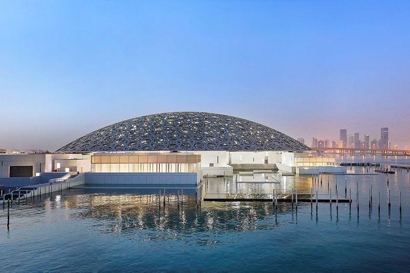 An external view of Louvre Museum in Abu Dhabi, during the sunset.
