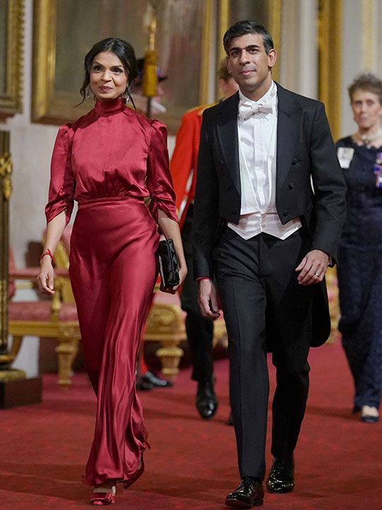 Britain's Prime Minister Rishi Sunak with his wife Akshata Murty arrive for a State Banquet at Buckingham Palace in central London on November 21, 2023, for South Korea's President Yoon Suk Yeol and his wife Kim Keon Hee on their first day of a three-day state visit to the UK. South Korean President Yoon Suk Yeol and First Lady Kim Keon Hee began a three-day trip to the UK on Tuesday, with King Charles III's hosting his first state visitors since his coronation.