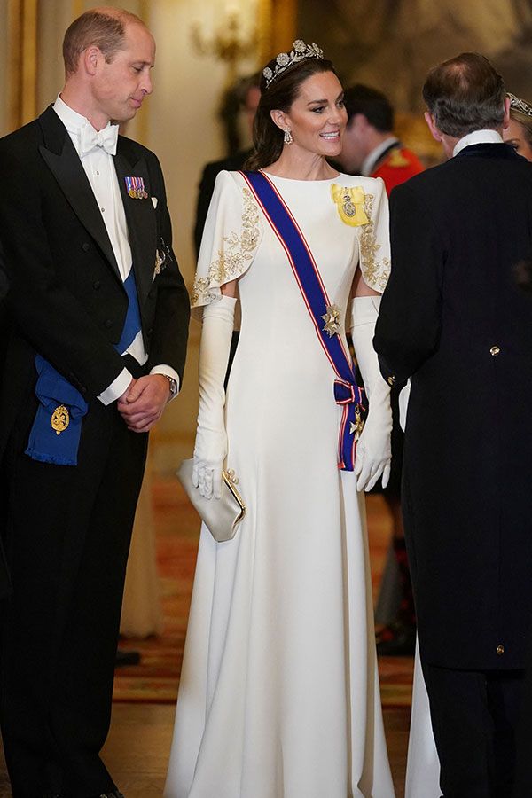 Britain's Prince William, Prince of Wales (L) and Britain's Catherine, Princess of Wales arrive for a a State Banquet at Buckingham Palace in central London on November 21, 2023, for South Korea's President Yoon Suk Yeol and his wife Kim Keon Hee on their first day of a three-day state visit to the UK. South Korean President Yoon Suk Yeol and First Lady Kim Keon Hee began a three-day trip to the UK on Tuesday, with King Charles III's hosting his first state visitors since his coronation. 