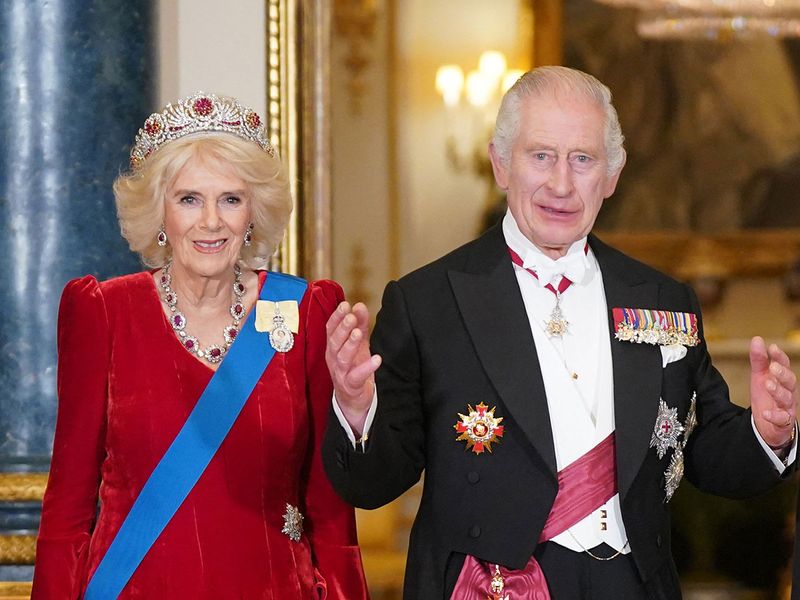 Britain's Queen Camilla (L) and Britain's King Charles III (R) welcome  South Korea's President Yoon Suk Yeol and his wife Kim Keon Hee during a State Banquet at Buckingham Palace in central London on November 21, 2023, on the first day of a three-day state visit to the UK. South Korean President Yoon Suk Yeol and First Lady Kim Keon Hee began a three-day trip to the UK on Tuesday, with King Charles III's hosting his first state visitors since his coronation.