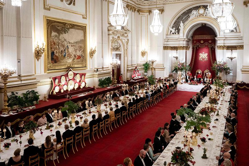Guests attend a State Banquet at Buckingham Palace in central London on November 21, 2023, for South Korea's President Yoon Suk Yeol and his wife Kim Keon Hee on their first day of a three-day state visit to the UK. South Korean President Yoon Suk Yeol and First Lady Kim Keon Hee began a three-day trip to the UK on Tuesday, with King Charles III's hosting his first state visitors since his coronation.