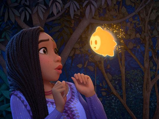 This image released by Disney shows Asha, voiced by Ariana DeBose, in a scene from the animated film 