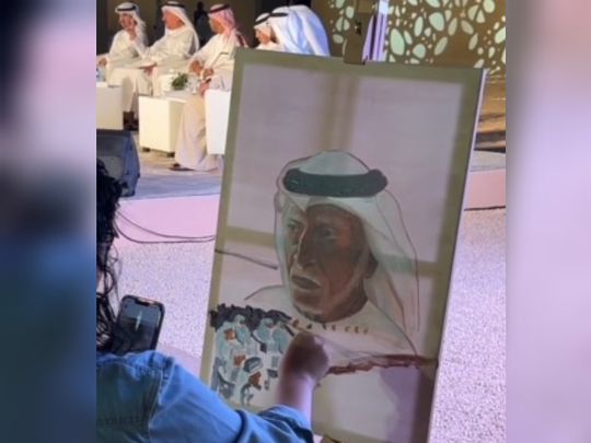 Stll-from-clip-of-Malak-Al-Ajou-painting-portraits-of-poets-on-sidelines-of-al-ain-book-festival-2023-1700916793794