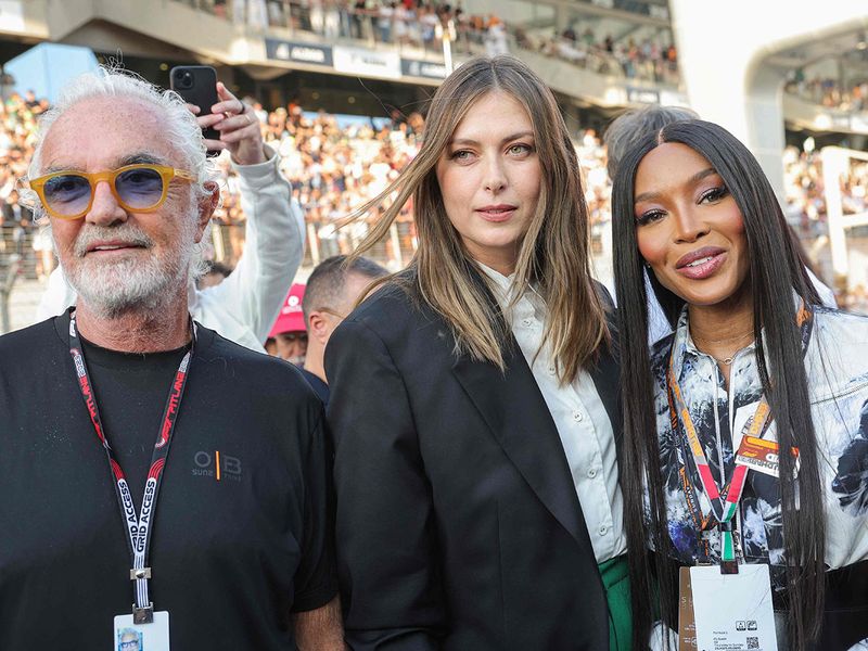 Italian businessman Flavio Briatore, Russian former tennis player Maria Sharapova and British supermodel Naomi Campbell pose for a picture ahead of the Abu Dhabi Formula One Grand Prix at the Yas Marina Circuit in the Emirati city on November 26, 2023. (Photo by Giuseppe CACACE / AFP)