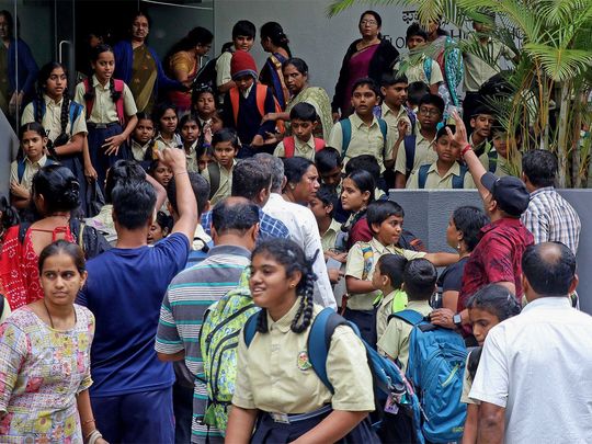 Bengaluru, Dec 01 (ANI): Students are being evacuated after a school received a bomb threat mail in Bengaluru on Friday. (ANI Photo)
