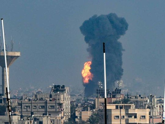 Smoke rises above buildings during an Israeli strike on Rafah in the southern Gaza Strip on December 1, 2023, after battles resumed between Israel and the Hamas after the temporary truce between Israel and Hamas expired.