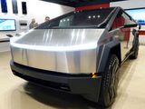 Tesla's new Cybertruck is shown on display at a Tesla store in San Diego, California, U.S., November 20, 2023.  REUTERS/Mike Blake/File Photo