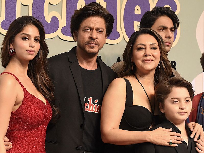 Bollywood actor Shah Rukh Khan (2nd L) with his family both son Aryan, AbRam, daughter Suhana and wife Gauri Khan attend the premiere of Netflix's Indian Hindi-Language teen musical comedy film ‘The Archies’ in Mumbai on December 5, 2023. (Photo by SUJIT JAISWAL / AFP)