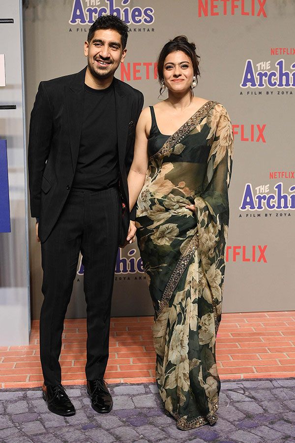 Bollywood actress Kajol (R) and director Ayan Mukherjee attend the premiere of Netflix's Indian Hindi-Language teen musical comedy film ‘The Archies’ in Mumbai on December 5, 2023. (Photo by SUJIT JAISWAL / AFP)