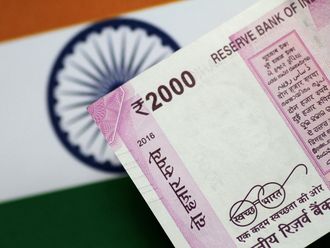 Indian rupee hits record low hurt by likely outflows