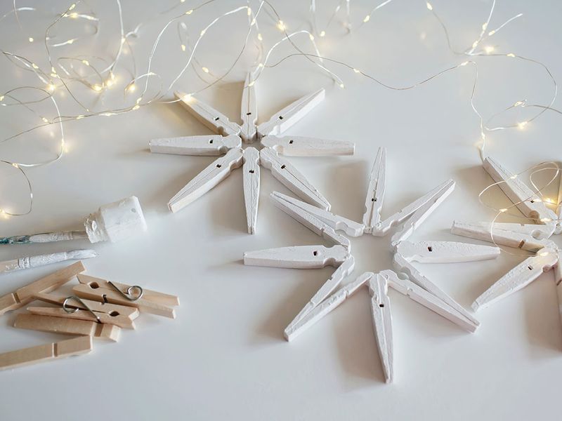 Wooden clothespin snowflakes