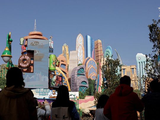 People attend the media preview tour of Disney World's first Zootopia-themed land attraction in Shanghai, China. 