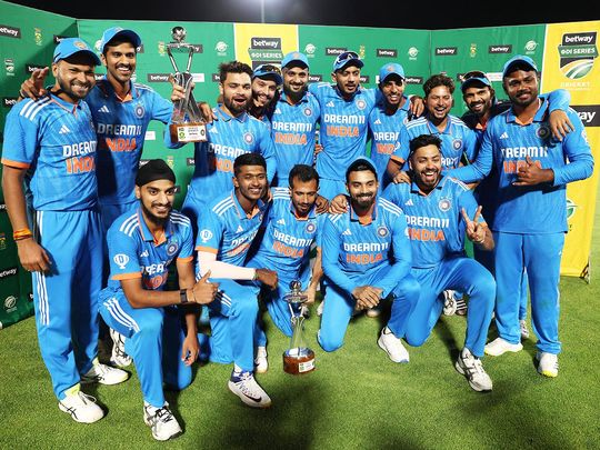 India players pose for a picture with the trophy as they celebrate winning the series against South Africa