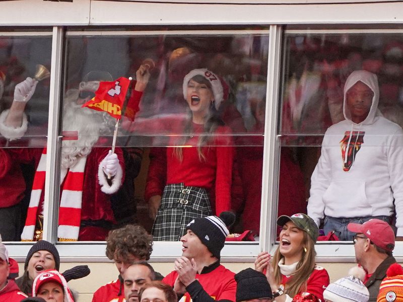 Dec 25, 2023; Kansas City, Missouri, USA; Entertainer Taylor Swift cheers during the first half of the game between the Kansas City Chiefs and Las Vegas Raiders at GEHA Field at Arrowhead Stadium. Mandatory Credit: Denny Medley-USA TODAY Sports     TPX IMAGES OF THE DAY     