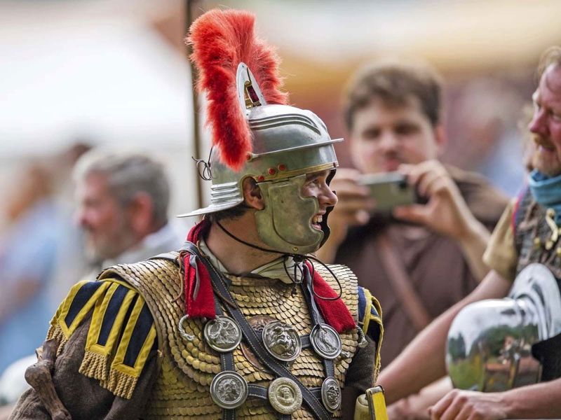 People who imagine themselves back in the Roman Empire, like this German in a Roman centurion costume, don't choose the more common role of young, unknown farmer, laboriously tilling a wheat field in southern Italy.Lino Mirgeler / PHOTO  alliance / dpa / AP file