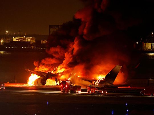 Japan Airlines' A350 airplane is on fire at Haneda international airport in Tokyo, on January 2, 2024. 