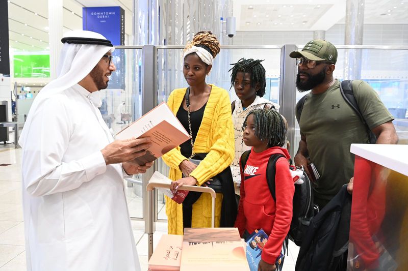 Dubai GDRFAD Distributing Mohammed bin Rashid’s book 1-1704364003166