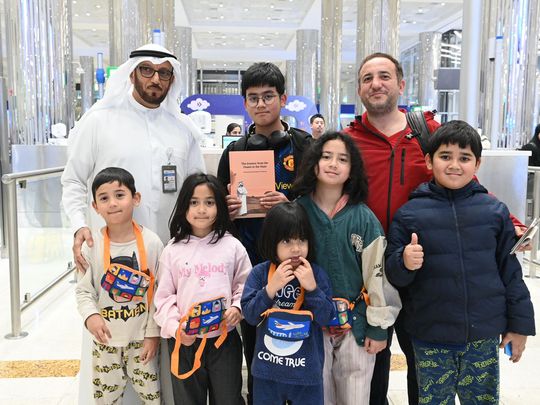 Dubai GDRFAD Distributing Mohammed bin Rashid’s book 656-1704364007016