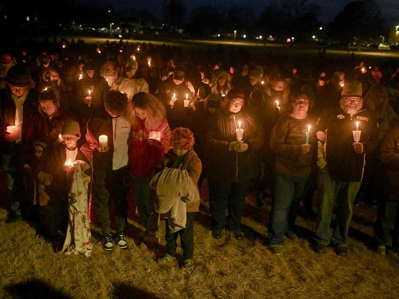 People attend a vigil, after a shooting at Perry High School, in Perry, Iowa, on January 4, 2024.  