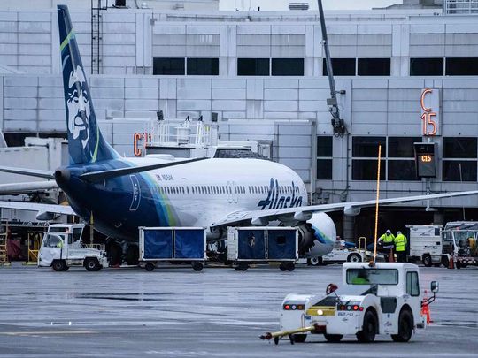 An Alaska Airlines Boeing 737 MAX 9 plane sits at a gate at Seattle-Tacoma International Airport on January 6, 2024 in Seattle, Washington.