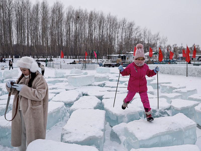 2024-01-08T112509Z_1384952285_RC26C5A8QTPW_RTRMADP_3_CHINA-ICEFESTIVAL-TOURISM