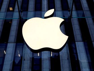 Apple buys AI startup as it races to add features