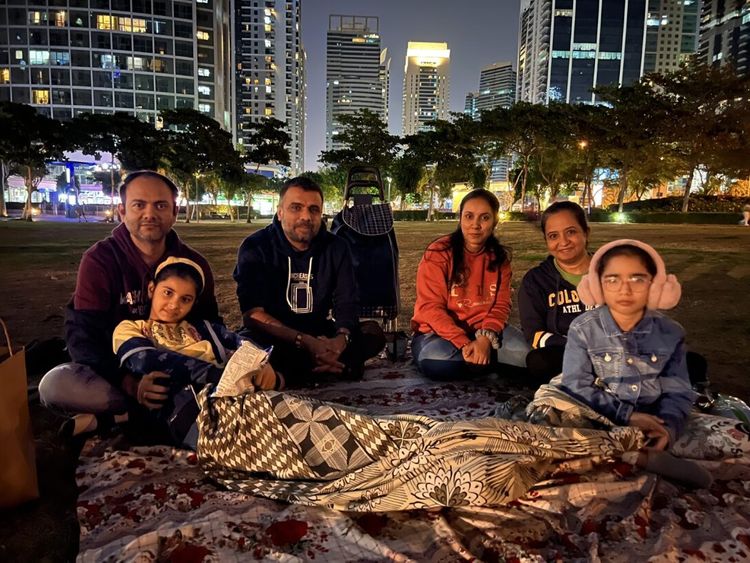 Viewers gather for a movie under the stars in JLT, Dubai.