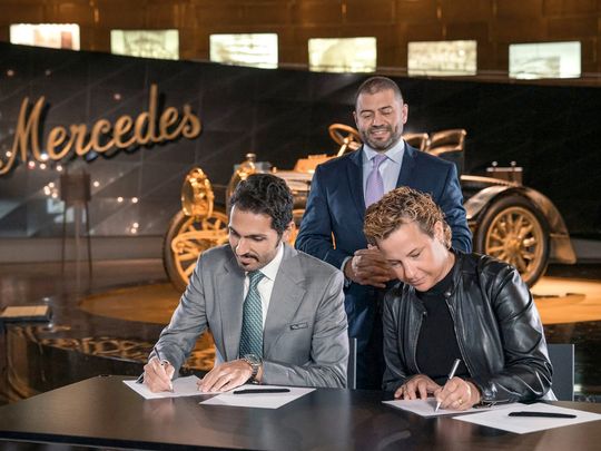 Muhammad Binghatti, CEO, Binghatti Properties and Britta Seeger, Member of the Board of Management of Mercedes-Benz Group AG, Marketing & Sales, sign the agreement