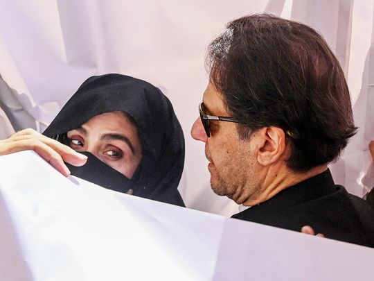 Former Pakistan Prime Minister Imran Khan with his wife Bushra Bibi