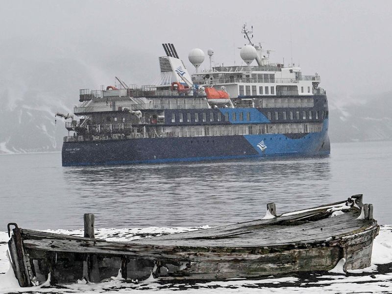 The Ocean Victory tourist ship sails at Whaler’s Bay in Deception Island, in the western Antarctic Peninsula. 