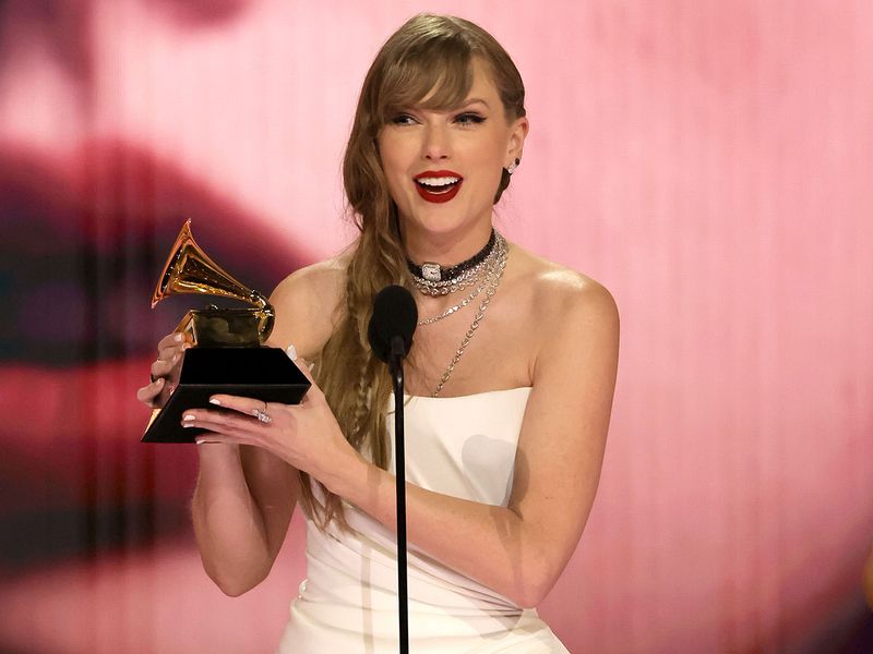 Taylor Swift at the 66th Grammy Awards, dressed in a custom Schiaparelli Haute Couture, designed by Daniel Roseberry.