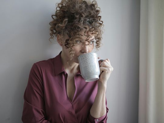 Person drinking coffee